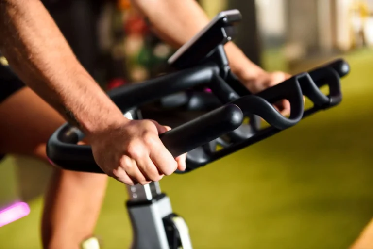 Man riding on stationary bike