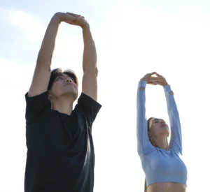 people doing mobility training, calisthenics outdoors workout